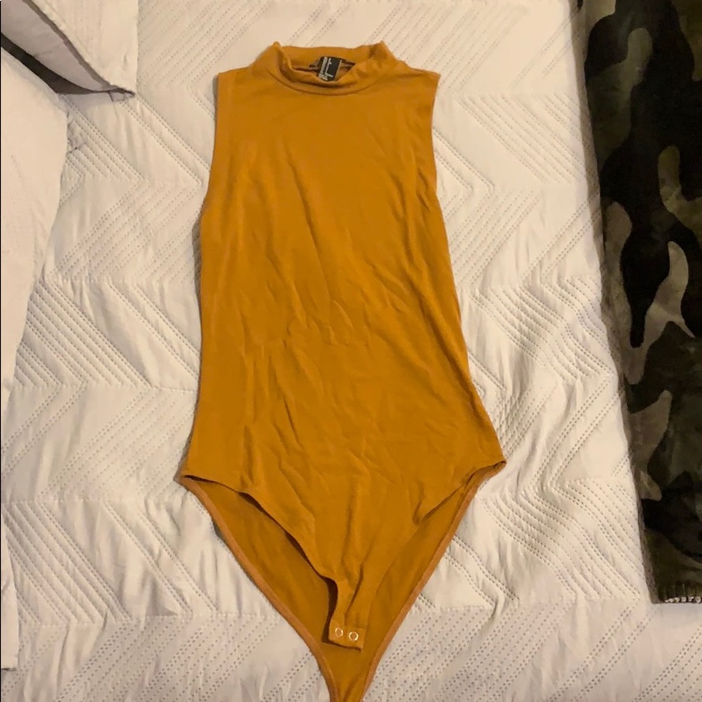 Turtle neck bodysuit.